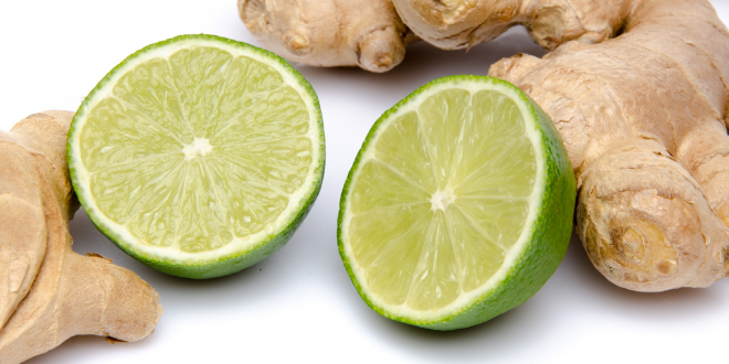 Ginger roots and sliced limes